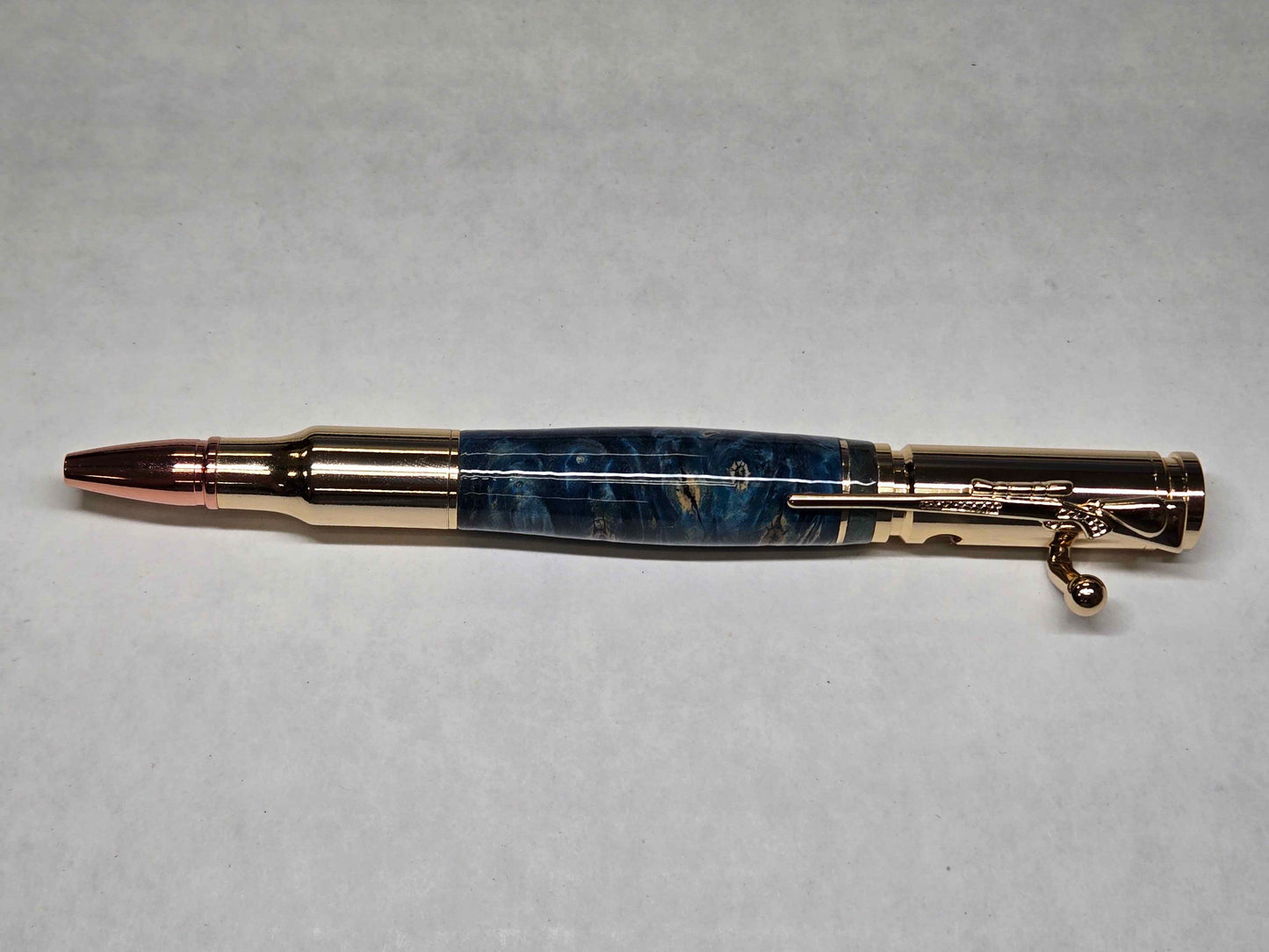 .30 Calibur Bolt Action Ballpoint Pen (Gold - Teal-Dyed Buckeye Burl with Brass Inlay)