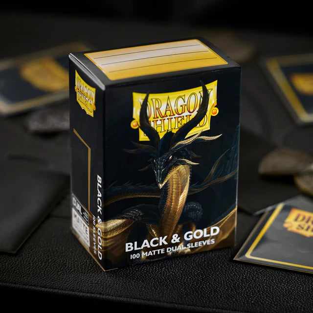 Dragon Shield Standard Dual Matte Sleeves: Black and Gold (100ct.)