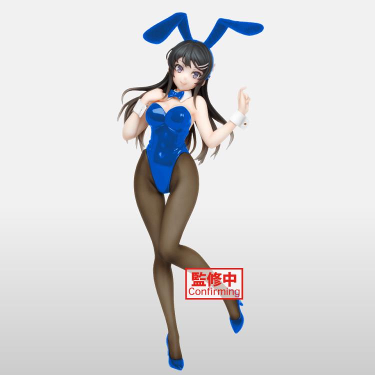 Anime style figure of a character in a bunny outfit with blue hair and white bunny ears, posed on a clear stand.
